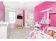 Pink bedroom with princess decor, carpet, and ample natural light from two large windows at 500 Garvin Dr, Woodstock, GA 30189
