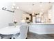 Beautiful kitchen and dining area featuring modern appliances, stylish lighting, and a table setting at 500 Garvin Dr, Woodstock, GA 30189