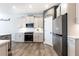 Modern kitchen with stainless steel appliances, sleek cabinets, and a functional layout at 500 Garvin Dr, Woodstock, GA 30189