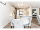Inviting eat-in kitchen featuring modern appliances, stylish decor and a dining area at 500 Garvin Dr, Woodstock, GA 30189