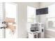 Bright play area features natural light and a decorative play kitchen at 500 Garvin Dr, Woodstock, GA 30189