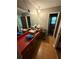 Bathroom with a mirrored vanity and cluttered countertop, showcasing potential at 7260 Cox Rd, Cumming, GA 30028