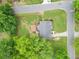 Aerial view of property with a spacious backyard, deck, garden beds, landscaping and surrounding trees at 984 Ridgecrest Se Dr, Smyrna, GA 30080