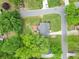 Aerial view of the property, showcasing a landscaped yard, deck, and established neighborhood at 984 Ridgecrest Se Dr, Smyrna, GA 30080