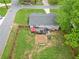Spacious fenced backyard featuring a deck with outdoor seating and raised garden beds at 984 Ridgecrest Se Dr, Smyrna, GA 30080