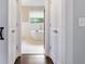 Bright bathroom featuring a modern soaking tub beneath a window, showcasing a clean and inviting space at 984 Ridgecrest Se Dr, Smyrna, GA 30080