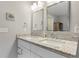 Bright bathroom with double vanity and granite countertop, offering ample space and style at 984 Ridgecrest Se Dr, Smyrna, GA 30080