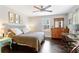 Comfortable bedroom with ample natural light, neutral tones, and a ceiling fan at 984 Ridgecrest Se Dr, Smyrna, GA 30080