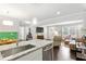 Bright kitchen area featuring stainless steel appliances, granite countertops, and an open layout at 984 Ridgecrest Se Dr, Smyrna, GA 30080