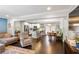 Spacious living room featuring an open layout connecting to the kitchen and dining area at 984 Ridgecrest Se Dr, Smyrna, GA 30080