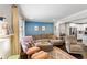 Comfortable living space with a sectional sofa, stylish decor, and modern open layout at 984 Ridgecrest Se Dr, Smyrna, GA 30080