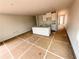 Open concept kitchen featuring a center island with a sink at 11606 E Lovejoy Rd, Hampton, GA 30228
