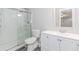 Bathroom features a glass enclosed shower, white vanity and cabinet, toilet, modern sink and large mirror at 1463 Shadowrock Hts, Marietta, GA 30062