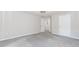 Bedroom features neutral carpet and paint, a closet, and an open door leading to another room at 1463 Shadowrock Hts, Marietta, GA 30062