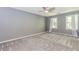 Bedroom with carpet, natural light, ceiling fan, and freshly painted walls at 1463 Shadowrock Hts, Marietta, GA 30062