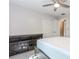 This bedroom has neutral walls, carpet flooring, a ceiling fan and a closet at 1463 Shadowrock Hts, Marietta, GA 30062