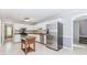 Spacious kitchen featuring stainless steel appliances, granite counters, and tile flooring at 1463 Shadowrock Hts, Marietta, GA 30062
