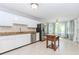 Bright kitchen features stainless steel appliances, granite counters, and an island at 1463 Shadowrock Hts, Marietta, GA 30062