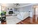 Bright living room with hardwood flooring, a fireplace, and plenty of natural light at 1463 Shadowrock Hts, Marietta, GA 30062
