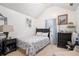 Bright bedroom features a large window and vaulted ceilings at 436 Berkshire Pl, Fairburn, GA 30213