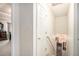 Hallway leading to the bedrooms with carpeted stairs at 436 Berkshire Pl, Fairburn, GA 30213