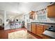 Bright kitchen with wood cabinets, stainless steel appliances and an open breakfast bar area at 436 Berkshire Pl, Fairburn, GA 30213