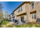 Back exterior of home shows patios with furniture and natural surroundings at 5800 Oakdale Se Rd # 147, Mableton, GA 30126