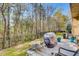 Cozy backyard with a patio, iron fence, and view of the woods for privacy at 5800 Oakdale Se Rd # 147, Mableton, GA 30126