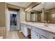 Bright bathroom with double sinks, and walk-in closet at 5800 Oakdale Se Rd # 147, Mableton, GA 30126