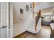 Spacious foyer with hardwood floors and staircase, leading into the open-concept living area at 5800 Oakdale Se Rd # 147, Mableton, GA 30126