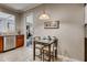 Functional kitchen features stainless steel appliances, eat-in dining area, and tile flooring at 5800 Oakdale Se Rd # 147, Mableton, GA 30126
