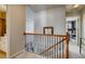 Landing area with wood railing and views to bathroom and home office at 5800 Oakdale Se Rd # 147, Mableton, GA 30126