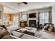 Comfortable living room with a fireplace, hardwood floors, and an open layout for easy entertaining at 5800 Oakdale Se Rd # 147, Mableton, GA 30126