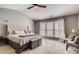 Spacious main bedroom with vaulted ceilings, plush carpet, and a large window for natural light at 5800 Oakdale Se Rd # 147, Mableton, GA 30126