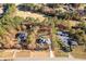 Sprawling estate aerial view with golf course and tree-lined property at 1874 Mcgarity Rd, Mcdonough, GA 30252