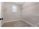 Walk-in closet with carpet flooring and wire shelving at 1874 Mcgarity Rd, Mcdonough, GA 30252