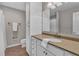 Bathroom featuring granite countertops, white cabinets, and a shower with a curtain at 2167 Crestridge Ne Trl, Brookhaven, GA 30329