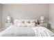 Comfortable bedroom featuring a neutral color palette and stylish bedside tables at 2167 Crestridge Ne Trl, Brookhaven, GA 30329