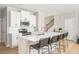 Contemporary kitchen featuring white cabinetry, stainless appliances, and an island with counter seating at 2167 Crestridge Ne Trl, Brookhaven, GA 30329