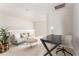 Comfortable loft area with neutral decor, perfect for a home office or study space at 2167 Crestridge Ne Trl, Brookhaven, GA 30329