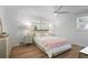 Serene bedroom with neutral tones, hardwood floors, and soft lighting, creating a peaceful and inviting atmosphere at 2515 Ridgewood Nw Rd, Atlanta, GA 30318