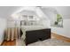 Bedroom featuring wood floors, a ceiling fan, and a sunny window seat at 2515 Ridgewood Nw Rd, Atlanta, GA 30318