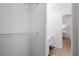 Walk-in closet leading into a dressing room with vanity and drawers at 2515 Ridgewood Nw Rd, Atlanta, GA 30318