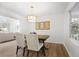 Charming dining room with modern light fixture and hardwood floors, ready for entertaining at 2515 Ridgewood Nw Rd, Atlanta, GA 30318
