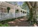 Cozy front porch with green shutters, plants, and rocking chairs for relaxing at 2515 Ridgewood Nw Rd, Atlanta, GA 30318