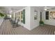 Spacious front porch offers ample seating with multiple rocking chairs and ceiling fans at 2515 Ridgewood Nw Rd, Atlanta, GA 30318