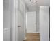 Hallway showing access to the laundry room, linen closet and access to additional areas of the property at 2515 Ridgewood Nw Rd, Atlanta, GA 30318