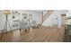 Open-concept living area with large windows, staircase, and hardwood floors at 2515 Ridgewood Nw Rd, Atlanta, GA 30318