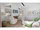 Bright living room with built-in shelving, white brick fireplace and modern decor, perfect for relaxing and entertaining at 2515 Ridgewood Nw Rd, Atlanta, GA 30318