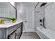 Beautiful bathroom with double sinks, granite countertop and marble tiled shower and bath at 2932 Valley Ridge Dr, Decatur, GA 30032